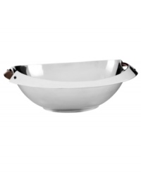 Polished aluminum alone makes Rivet serveware a standout, but with contrasting bronze handles and a sleek yet generously proportioned silhouette, this Dansk serving bowl embodies modern sophistication. (Clearance)