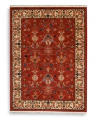 In homage to renowned artist William Morris, this rug features his signature vine and pomegranate motifs framed by an acanthus leaf border inspired by a Morris & Co. tapestry. A special dyeing process imparts subtle shadings to a dynamic palette of blues, greens, terra cotta, saffron yellow and ivory tones on a warm red ground. The resulting striated effect recreates the depth of hue achieved by aged vegetable dyes. Woven of premium worsted wool and finished with a patented luster wash for indulgent softness. In homage to renowned artist William Morris, this rug features his signature vine and pomegranate motifs framed by an acanthus leaf border inspired by a Morris & Co. tapestry. A special dyeing process imparts subtle shadings to a dynamic palette of blues, greens, terra cotta, saffron yellow and ivory tones on a warm red ground. The resulting striated effect recreates the depth of hue achieved by aged vegetable dyes. Woven of premium worsted wool and finished with a patented luster wash for indulgent softness.