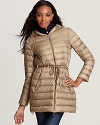 Keep out the cold with this cozy and perfectly packable Moncler lightweight down puffer coat. Keep out the cold with this cozy and perfectly packable Moncler lightweight down puffer coat.