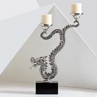 Experience the world of Natori where East meets West, and art meets life. Inspired by a passion for uniqueness, this dragon candleholder cuts an imposing figure on bookcases, dressers, tables and mantels. Experience the world of Natori where East meets West, and art meets life. Inspired by a passion for uniqueness, this dragon candleholder cuts an imposing figure on bookcases, dressers, tables and mantels.