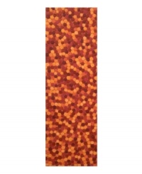 There's no denying that this rug is hot. Ablaze with hundreds of dazzling red and orange pompom shapes, this one-of-a-kind rug brings a burst of color and texture to otherwise plain floors. Constructed of plush, dense wool, you'll be treated to a rug with a luxurious softness and adventurous design you won't find anywhere else.