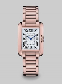 From the Tank Collection. A take from the 1917 creation, this modern 18k pink gold version has a seamlessly integrated strap, a sapphire crystal and an aligned, set-in crown for a clean design. Quartz movementWater resistant to 3 ATMRectangular 18k pink gold case, 30.2mm (1.2) X 22.7mm (.9)Smooth bezelSilvered and lacquered flinqué dialRoman numeral markers18k pink gold strapMade in Switzerland From the Tank Collection. A take from the 1917 creation, this modern 18k pink gold version has a seamlessly integrated strap, a sapphire crystal and an aligned, set-in crown for a clean design. Quartz movementWater resistant to 3 ATMRectangular 18k pink gold case, 30.2mm (1.2) X 22.7mm (.9)Smooth bezelSilvered and lacquered flinqué dialRoman numeral markers18k pink gold strapMade in Switzerland