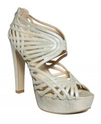 Glamour takes a turn for the exotic. Metallic snake-print leather and intricately woven straps make their mark on the Cannonball platform sandals by Nine West. Glamour takes a turn for the exotic. Metallic snake-print leather and intricately woven straps make their mark on the Cannonball platform sandals by Nine West.