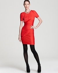 Dramatic pleating crafts a body-con Halston Heritage dress. Juxtapose the feminine silhouette with a tough-girl leather jacket for a masterfully mixed look that is quite chic and sophisticated. Dramatic pleating crafts a body-con Halston Heritage dress. Juxtapose the feminine silhouette with a tough-girl leather jacket for a masterfully mixed look that is quite chic and sophisticated.