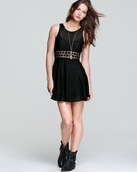 Girlish with an edge, this Free People mini dress flaunts a skin-baring crochet waistband. Girlish with an edge, this Free People mini dress flaunts a skin-baring crochet waistband.