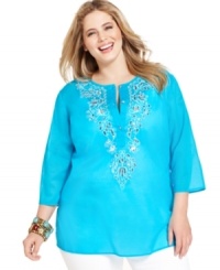 A dazzling embellished front beautifies J Jones New York's three-quarter-sleeve plus size tunic top-- pair it with your go-to causal bottoms for a chic look. A dazzling embellished front beautifies J Jones New York's three-quarter-sleeve plus size tunic top-- pair it with your go-to causal bottoms for a chic look.