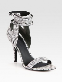 Speckled lizard-print leather design with sexy wrap-around straps hitting just above the ankle. Self-covered heel, 4 (100mm)Lizard-print leather upperAdjustable ankle strapsLeather lining and solePadded insoleImported Speckled lizard-print leather design with sexy wrap-around straps hitting just above the ankle. Self-covered heel, 4 (100mm)Lizard-print leather upperAdjustable ankle strapsLeather lining and solePadded insoleImported
