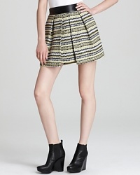 Take your look downtown with this Milly skirt, designed with a leather waistband and zigzag-print tweed. The mini silhouette gives a modern makeover to pleats, taking the feminine detail in a forward direction. Take your look downtown with this Milly skirt, designed with a leather waistband and zigzag-print tweed. The mini silhouette gives a modern makeover to pleats, taking the feminine detail in a forward direction.
