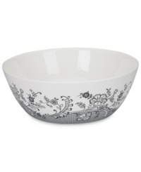 Oleg Cassini weaves a table of playful sophistication with the Ava vegetable bowl, featuring lacy flowers and dots in timeless black and white. Oleg Cassini weaves a table of playful sophistication with the Ava vegetable bowl, featuring lacy flowers and dots in timeless black and white.