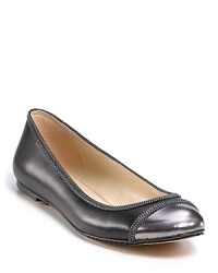 Gleaming and glittering, these chain-decked flats feature a metallic captoe and loads of attitude. By KORS Michael Kors. Gleaming and glittering, these chain-decked flats feature a metallic captoe and loads of attitude. By KORS Michael Kors.