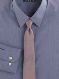A modern, finely tailored addition to any dress wardrobe with a hint of stretch for superior comfort.ButtonfrontPoint collar97% cotton/3% elastaneDry cleanImported A modern, finely tailored addition to any dress wardrobe with a hint of stretch for superior comfort.ButtonfrontPoint collar97% cotton/3% elastaneDry cleanImported