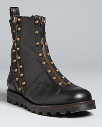 Studded stars, these MARC BY MARC JACOBS moto boots have playful, casual style zipped up. Studded stars, these MARC BY MARC JACOBS moto boots have playful, casual style zipped up.