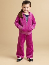 Soft, plush velour with a cozy hood and touches of Juicy sparkle.Attached hoodFront zip with J pullLong sleeves with ribbed knit cuffs and sparkle heart elbow patchesBeaded JC chest logoSplit kangaroo pocketsRibbed knit bottom76% cotton/24% polyesterMachine washImported Soft, plush velour with a cozy hood and touches of Juicy sparkle.Attached hoodFront zip with J pullLong sleeves with ribbed knit cuffs and sparkle heart elbow patchesBeaded JC chest logoSplit kangaroo pocketsRibbed knit bottom76% cotton/24% polyesterMachine washImported