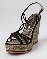 In vibrant fuchsia, these Jean-Michel Cazabat wedges pair summery raffia with soft suede--creating a shoe that begs to be taken along on tropical vacations. In vibrant fuchsia, these Jean-Michel Cazabat wedges pair summery raffia with soft suede--creating a shoe that begs to be taken along on tropical vacations.
