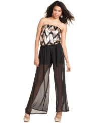 Primed for the dance floor, this jumpsuit from Urban Hearts totally electrifies with its sequined bodice and sheer palazzo pants! Primed for the dance floor, this jumpsuit from Urban Hearts totally electrifies with its sequined bodice and sheer palazzo pants!