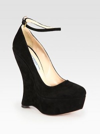 Elevated wedge silhouette with an adjustable ankle strap. Self-covered wedge, 6 (150mm)Covered platform, 1¾ (45mm)Compares to a 4¼ heel (110mm)Suede upperAdjustable ankle strapLeather lining and solePadded insoleMade in Italy Elevated wedge silhouette with an adjustable ankle strap. Self-covered wedge, 6 (150mm)Covered platform, 1¾ (45mm)Compares to a 4¼ heel (110mm)Suede upperAdjustable ankle strapLeather lining and solePadded insoleMade in Italy