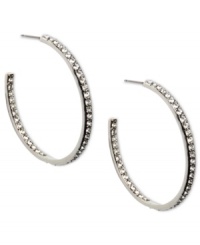 Cover every angle in sparkle. Givenchy's elegant hoop earrings flaunt an inside out design crystallized with Swarovski elements. Crafted in imitation rhodium plated mixed metal. Approximate diameter: 1-5/8 inches. Cover every angle in sparkle. Givenchy's elegant hoop earrings flaunt an inside out design crystallized with Swarovski elements. Crafted in imitation rhodium plated mixed metal. Approximate diameter: 1-5/8 inches.
