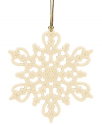 Turn a white Christmas fantasy into reality with this classic snowflake ornament from Lenox. Intricate pierced detail and an elegant ivory glaze help you and your family create your very own winter wonderland. Turn a white Christmas fantasy into reality with this classic snowflake ornament from Lenox. Intricate pierced detail and an elegant ivory glaze help you and your family create your very own winter wonderland.