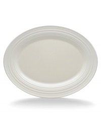 With the natural appeal of hand-thrown pottery, the Swirl White oval platter achieves unfussy elegance in classic stoneware. Coordinates with Mikasa white dinnerware. The dishes have a smooth, glossy surface that contrasts the matte ribbed exterior for dynamic casual tables. With the natural appeal of hand-thrown pottery, the Swirl White oval platter achieves unfussy elegance in classic stoneware. Coordinates with Mikasa white dinnerware. The dishes have a smooth, glossy surface that contrasts the matte ribbed exterior for dynamic casual tables.