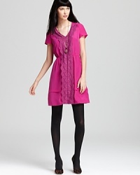 A beautiful tonal lace panel descends the front of this silk-spun MARC BY MARC JACOBS dress for a flirty and unmistakably feminine look you will adore. We do. A beautiful tonal lace panel descends the front of this silk-spun MARC BY MARC JACOBS dress for a flirty and unmistakably feminine look you will adore. We do.