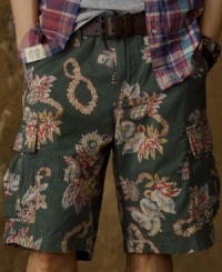 A tropical print adds laid-back flair to an otherwise rugged cargo short for a look that is casual and eclectic. A tropical print adds laid-back flair to an otherwise rugged cargo short for a look that is casual and eclectic.