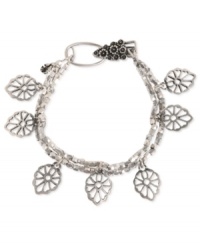 Lucky Brand turns over a stylish new leaf with this charm bracelet. It's crafted from silver-tone mixed metal with plastic accents adding to the appeal. Approximate length: 7-5/8 inches. Lucky Brand turns over a stylish new leaf with this charm bracelet. It's crafted from silver-tone mixed metal with plastic accents adding to the appeal. Approximate length: 7-5/8 inches.