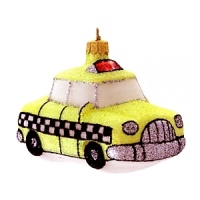 One of the most iconic elements of New York city is its fleet of checker cabs. This cab is decorated in very fine glitter and is adorable on your tree. One of the most iconic elements of New York city is its fleet of checker cabs. This cab is decorated in very fine glitter and is adorable on your tree.