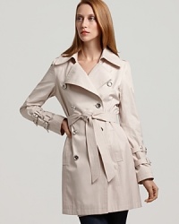Double belted cuffs lend a chic, modern update to this classic trench from Via Spiga. Double belted cuffs lend a chic, modern update to this classic trench from Via Spiga.