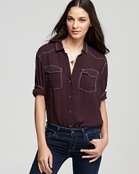 This berry-hued James Perse shirt borrows from classic western styling, featuring allover contrast stitched details and double front patch pockets. This berry-hued James Perse shirt borrows from classic western styling, featuring allover contrast stitched details and double front patch pockets.