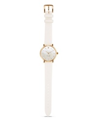 Take a classic approach to accessorizing with this leather strap watch from kate spade new york. With a gold-plated case and Mother-of-Pear dial, it's a timeless choice. Take a classic approach to accessorizing with this leather strap watch from kate spade new york. With a gold-plated case and Mother-of-Pear dial, it's a timeless choice.