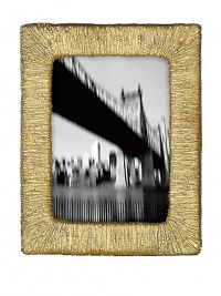 It's metal artistry with a New York edge- display your favorite memories in this hand-cast aluminum frame for a distinctive touch to any home display.HandmadeAluminum alloyImported It's metal artistry with a New York edge- display your favorite memories in this hand-cast aluminum frame for a distinctive touch to any home display.HandmadeAluminum alloyImported