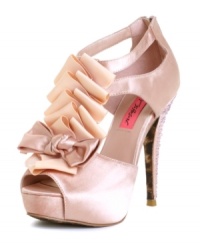 Nothing wrong with ruffling people's feathers a bit. The Iconn-R platform pumps by Betsey Johnson turn heads with a majorly ruffled T-strap and sparkling rhinestone-covered heel. Nothing wrong with ruffling people's feathers a bit. The Iconn-R platform pumps by Betsey Johnson turn heads with a majorly ruffled T-strap and sparkling rhinestone-covered heel.
