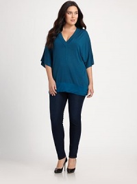 Feminine flutter sleeves will provide arm coverage and its relaxed fit will flawlessly flatter your shape. Deep v-necklineFlutter sleevesPull-on styleAbout 34 from shoulder to hemViscose/polyesterDry cleanImported Feminine flutter sleeves will provide arm coverage and its relaxed fit will flawlessly flatter your shape. Deep v-necklineFlutter sleevesPull-on styleAbout 34 from shoulder to hemViscose/polyesterDry cleanImported