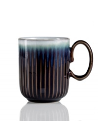 A rustic glaze, textured feel and rounded base make Denby's fluted mug a stylish go-to for cocoa, coffee and soup. Ultra-sturdy stoneware heats and reheats easily for everyday, anytime use. A rustic glaze, textured feel and rounded base make Denby's fluted mug a stylish go-to for cocoa, coffee and soup. Ultra-sturdy stoneware heats and reheats easily for everyday, anytime use.
