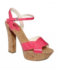 Turn up the volume on summer style. Neon colors and the chunkiest of cork heels make the Yona platform sandals by GUESS hot to trot.