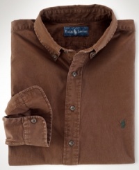 A trim-fitting sport shirt is woven from crisp cotton and adorned with Ralph Lauren's embroidered pony for added polish. A trim-fitting sport shirt is woven from crisp cotton and adorned with Ralph Lauren's embroidered pony for added polish.
