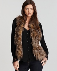 Brimming with exotic appeal, this Karen Kane faux fur vest layers over everyday staples for a sophisticated statement. Brimming with exotic appeal, this Karen Kane faux fur vest layers over everyday staples for a sophisticated statement.