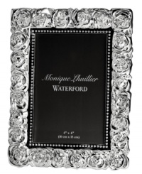 Luxe silver plate blossoms into the gorgeous Sunday Rose picture frame with Monique Lhuillier's designer touch. A beautiful way to preserve joyful moments. Luxe silver plate blossoms into the gorgeous Sunday Rose picture frame with Monique Lhuillier's designer touch. A beautiful way to preserve joyful moments.