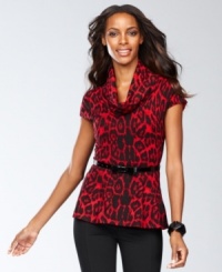 Purr-fectly adorable, this sweater from INC mixes animal print, bold color and tops it all off with bow belt. (Clearance)