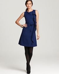 Rolling ruffles lend playful spirit to a flared Lafayette 148 New York dress for classic feminine charm. Rolling ruffles lend playful spirit to a flared Lafayette 148 New York dress for classic feminine charm.