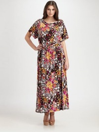A vividly printed, ankle-grazing design with a relaxed yet flattering fit.Draped necklineShort sleevesElasticized waistlinePull-on styleAbout 42 from natural waist48% rayon/42% polyester/10% spandexDry cleanMade in USA of imported fabric A vividly printed, ankle-grazing design with a relaxed yet flattering fit.Draped necklineShort sleevesElasticized waistlinePull-on styleAbout 42 from natural waist48% rayon/42% polyester/10% spandexDry cleanMade in USA of imported fabric