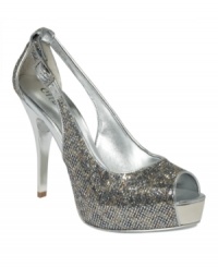 The dance floor is calling. Outshine the brightest disco ball with the shimmering and sultry Hondola3 peep-toe pumps by GUESS. The dance floor is calling. Outshine the brightest disco ball with the shimmering and sultry Hondola3 peep-toe pumps by GUESS.