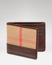Each side of this unique wallet boasts a different take on the signature check pattern, a modern design for all your daily essentials from the always urbane Burberry. Each side of this unique wallet boasts a different take on the signature check pattern, a modern design for all your daily essentials from the always urbane Burberry.