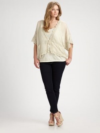 This vintage-inspired style features awe-inspiring lace and a self-tie waist. Pair this dolman-sleeve top with a pencil skirt or slim-fit pants. U-neckDolman sleevesSelf-tie closureFront pocketsAbout 28 from shoulder to hemRayonMachine washImported This vintage-inspired style features awe-inspiring lace and a self-tie waist. Pair this dolman-sleeve top with a pencil skirt or slim-fit pants. U-neckDolman sleevesSelf-tie closureFront pocketsAbout 28 from shoulder to hemRayonMachine washImported