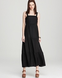 Tiers of floaty silk cascade the length of this floor-sweeping Eileen Fisher sundress for a silhouette that is effortlessly boho-chic. Tiers of floaty silk cascade the length of this floor-sweeping Eileen Fisher sundress for a silhouette that is effortlessly boho-chic.