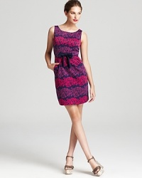 Stripes of regal brocade dance across this Lilly Pulitzer dress, accentuated by a rich palette and delicate bow for stunning day-to-night style. Stripes of regal brocade dance across this Lilly Pulitzer dress, accentuated by a rich palette and delicate bow for stunning day-to-night style.