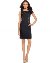 Decorative zippers at the front and an exposed zipper at the back add edge to Calvin Klein's petite sheath dress. Decorative zippers at the front and an exposed zipper at the back add edge to Calvin Klein's petite sheath dress.