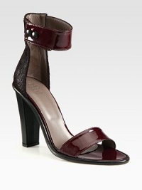 A dramatic ankle strap silhouette pairing glossy patent leather with lush calf hair for a luxe effect. Leather-covered heel, 4¾ (120mm)Patent leather and calf hair upperPatent leather ankle strap with double snap closuresLeather lining and solePadded insoleMade in Italy A dramatic ankle strap silhouette pairing glossy patent leather with lush calf hair for a luxe effect. Leather-covered heel, 4¾ (120mm)Patent leather and calf hair upperPatent leather ankle strap with double snap closuresLeather lining and solePadded insoleMade in Italy