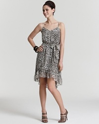 Take your look to fierce new heights in this Charlie Jade leopard-print dress flaunting lush ruffles and an asymmetric hem for standout style on date night. Decadent and dramatic, this silhouette gets a lift from chunky bangles and towering pumps. Take your look to fierce new heights in this Charlie Jade leopard-print dress flaunting lush ruffles and an asymmetric hem for standout style on date night. Decadent and dramatic, this silhouette gets a lift from chunky bangles and towering pumps.