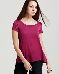 A vivid jewel tone lends luxe appeal to a classic Eileen Fisher tee. Set off the shade with of-the-moment printed pants and turn heads in brilliant color. A vivid jewel tone lends luxe appeal to a classic Eileen Fisher tee. Set off the shade with of-the-moment printed pants and turn heads in brilliant color.